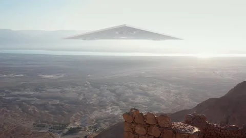 Large Triangle ufo alien saucer over sea and desert mountains-Aerial Stock Footage 140059935
