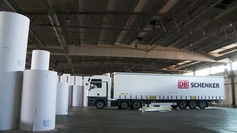 Large Truck Inside Warehouse Surrounded by Paper Rolls Video stock 315210576
