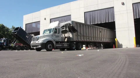 Large truck unloading trash (1 of 2) Stock Footage 31957246