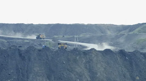 Large trucks carry coal Stock Footage 63357648