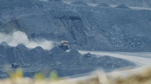 Large trucks carry coal Stock Footage 63357767