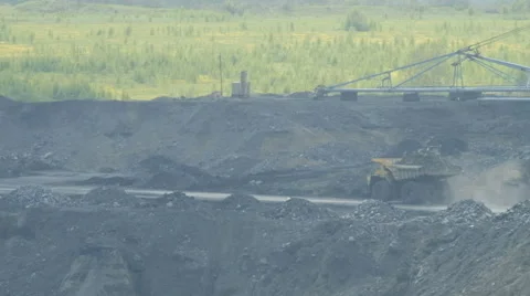 Large trucks carry coal Stock Footage 63358857