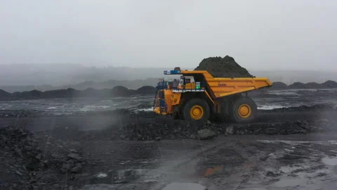 Large trucks work at the coal mine Video stock 154363231