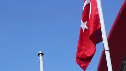 Large Turkish flags on high flagpoles. There are flags of sports teams on t.. Stock Footage 259825115
