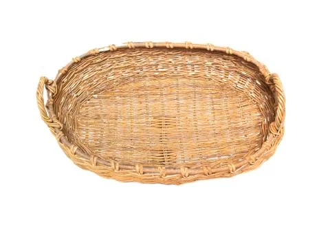 Large two-hand wicker basket made of wicker on a white background, isolate Stock Photos