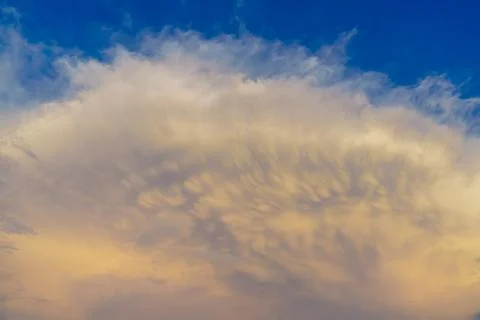 Large unusual cloud in the blue sky Stock Photos