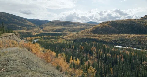 Large valley with a river running through in the fall Stock Footage 115631729