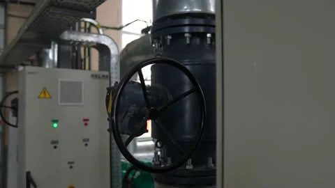 Large valve in the boiler room. Stock Footage 237873193