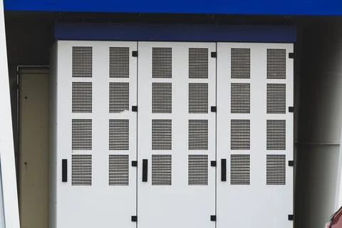 Large ventilated electrical equipment cabinet in Norway, modern power distr.. Stock Photos