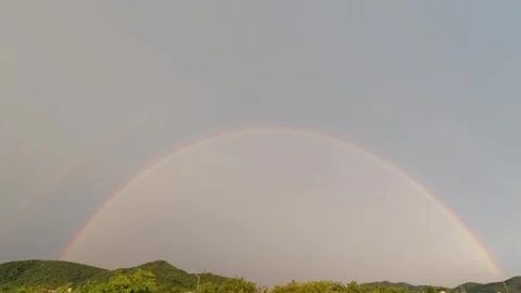 Large vibrant rainbow arching Stock Footage 344513685