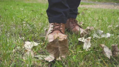 Large view of brown boots on a woman's feet Stock Footage 95922880