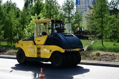 Large view on the road rollers working on the new road construction site Stock Photos