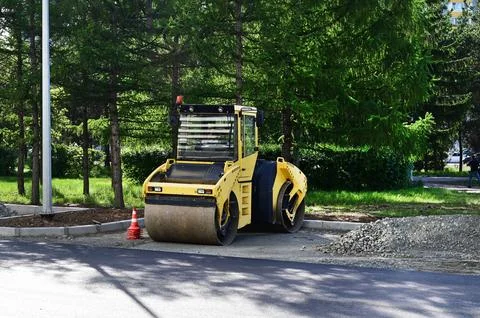 Large view on the road rollers working on the new road construction site Stock Photos