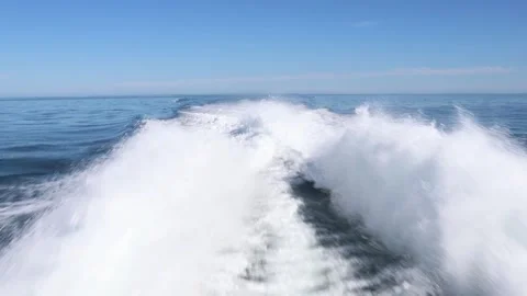Large wake behind a fast speeding boat, crossing the ocean fast Stock Footage 341902736