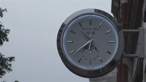Large Wall Clock - Patek Philippe - Oxford Street, London Stock Footage 93206654