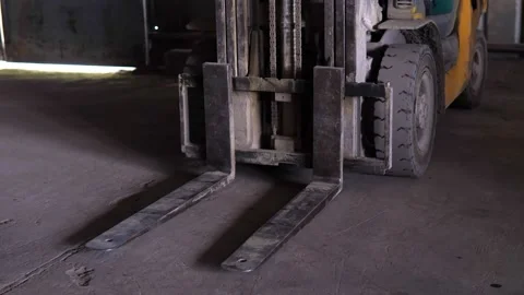 A large warehouse of building materials. Loader close-up Stock Footage 156382955