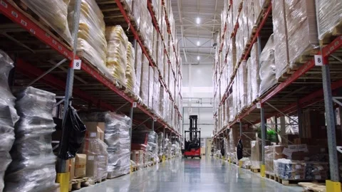 Large warehouse, factory, boxes, shelf. Machine work and vehicle delivering Stockbeeldmateriaal 274422161