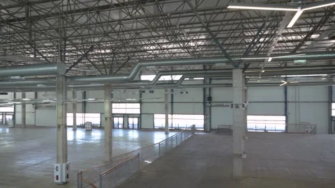 Large Warehouse Interior with Ductwork and Lighting Stock Footage 343175756