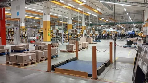 Large warehouse with palletized parcels and organized logistics distribution Stock Footage 333488582