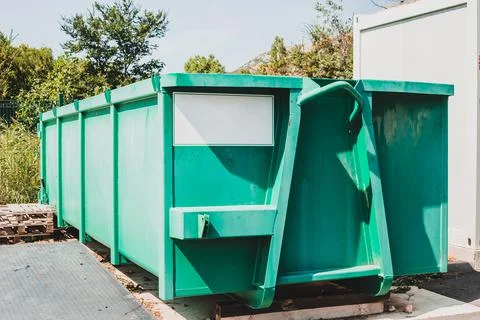 Large waste container at local sorting station Stock Photos