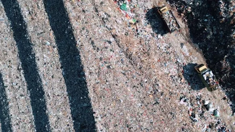 Large Waste Dump and Trash Truck with Garbage in Aerial Top View 4k Stock Footage 258643641