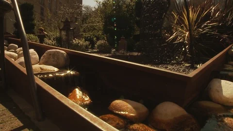 Large Water Feature in front of bar - Slider shot left to right Stock Footage 112721327