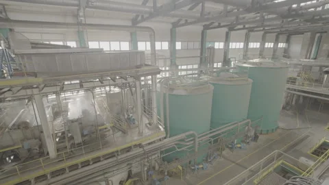 Large water storage tanks in spacious hall of cardboard factory 스톡 동영상 290509927