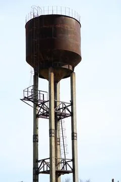 A large water tower on the background of the sky Stock Photos