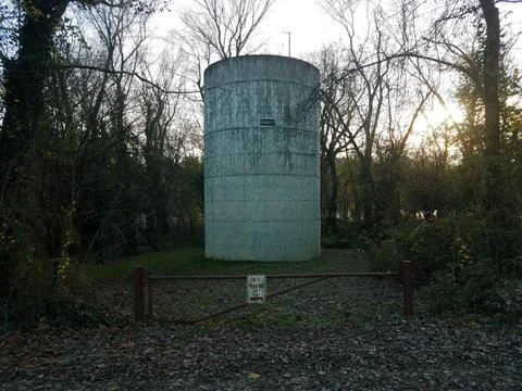 Large water tower or storage tank with no parking sign Stock Photos