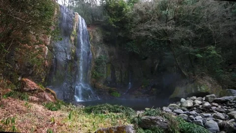 Large waterfall deep in the forest Stock Footage 260853126