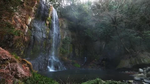 Large waterfall deep in the forest Stock Footage 260853187