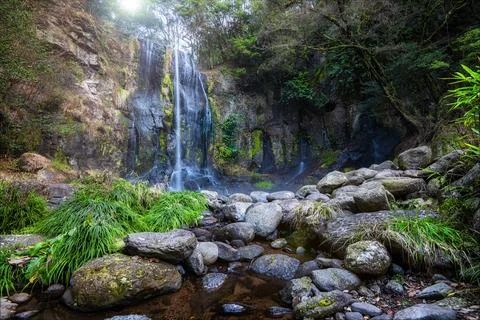Large waterfall deep in the forest Stock Photos