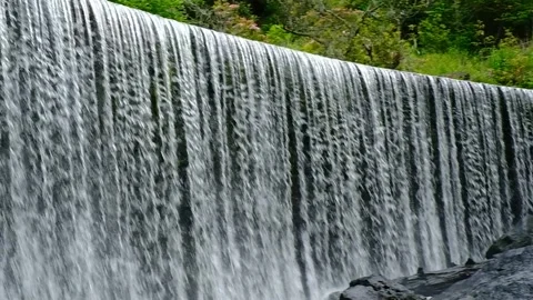 Large Waterfall - Edge of the forest into the fall - Slow Motion Stock Footage 243771432