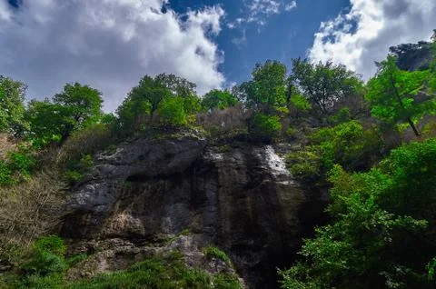 A large waterfall in a forest Stock Photos