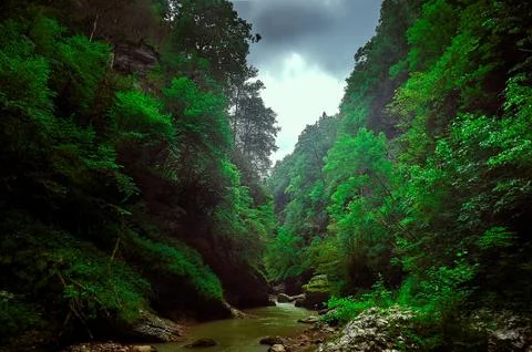 A large waterfall in a forest Stock Photos