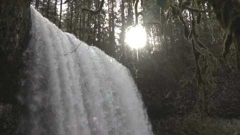 Large waterfall with sun Stock Footage 87935721