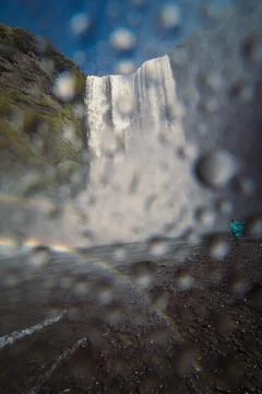Large waterfall view through drops landscape photo Stock Photos