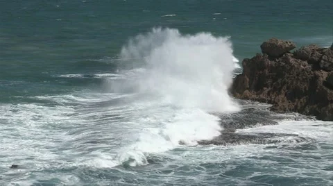 Large wave breaking on rocks  Stock Footage 11139010