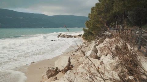 A large wave breaks on the shore Stock Footage 128683741