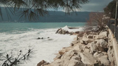 A large wave breaks on the shore Stock Footage 128683742