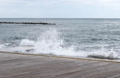 Large wave crashed against flood walls on a beach near Paphos, Cyprus. The se Photos