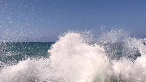 Large wave crashes against the pier creating a lot of spray and foam. Stock Footage 158235256