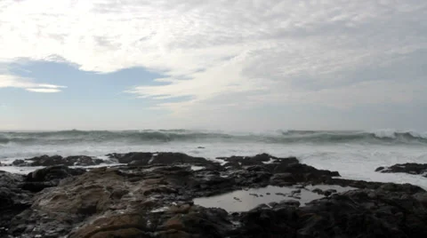 Large waves breaking on rocks in California Video stock 35168545