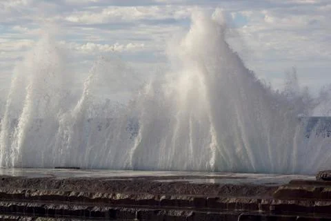 Large waves breaking on the shore Stock Photos