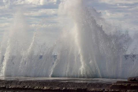 Large waves breaking on the shore Stock Photos