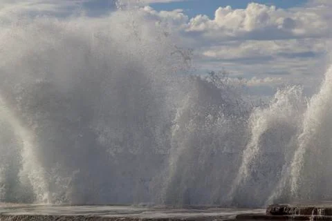 Large waves breaking on the shore Stock Photos