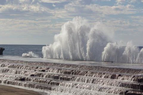 Large waves breaking on the shore Stock Photos