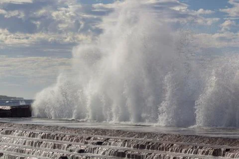 Large waves breaking on the shore Stock Photos