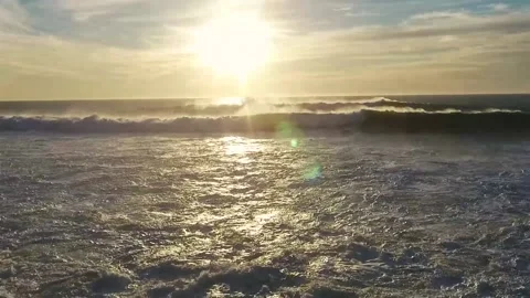 Large waves crashing onshore at Mavericks Stock Footage
