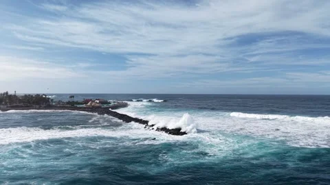 Large waves exploding over breakwater Pueto de la Cruz Tenerife Spain Stock-Footage 331150036